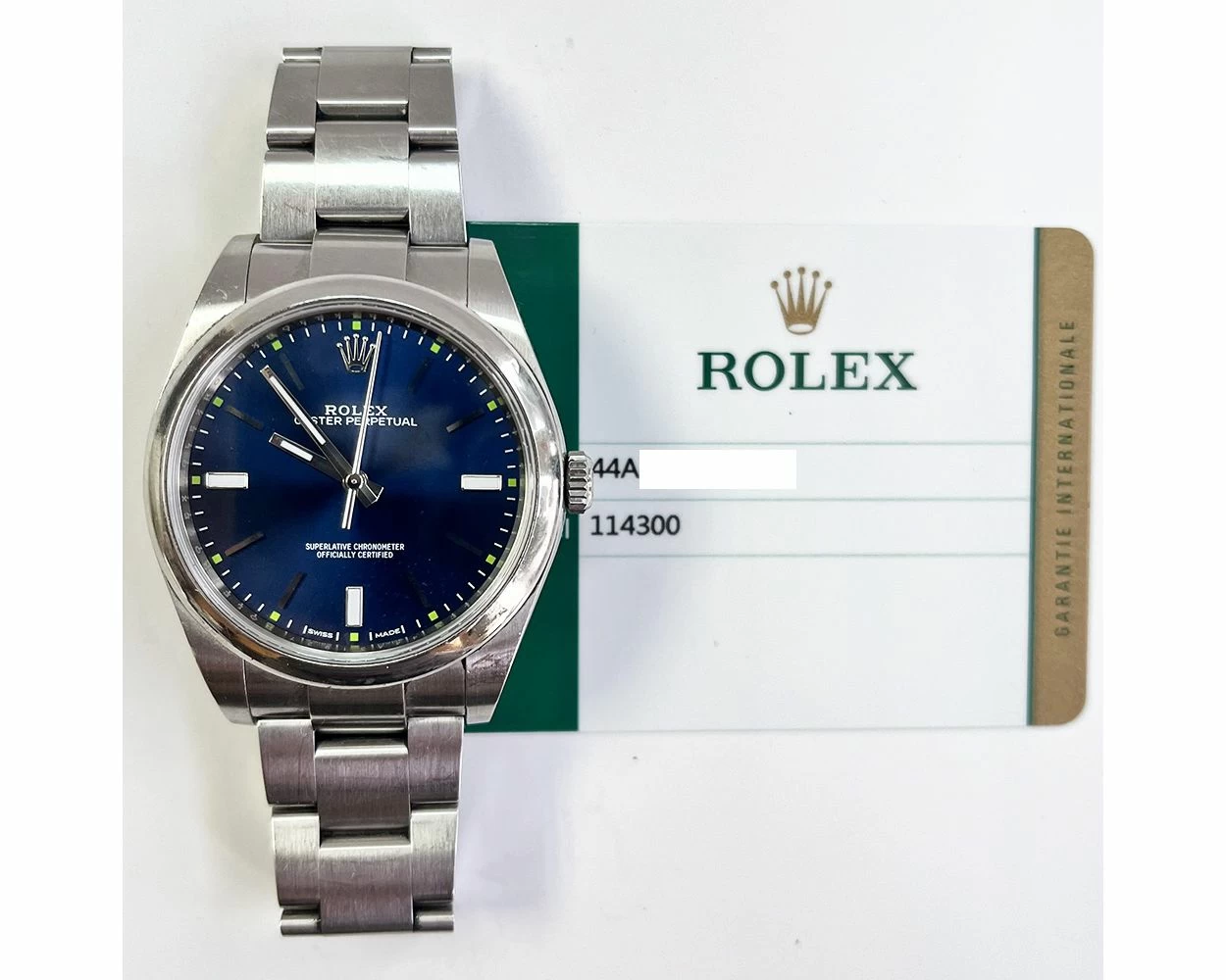 Rolex Oyster Perpetual 39 Stainless Steel Blue Dial 114300 Box Papers