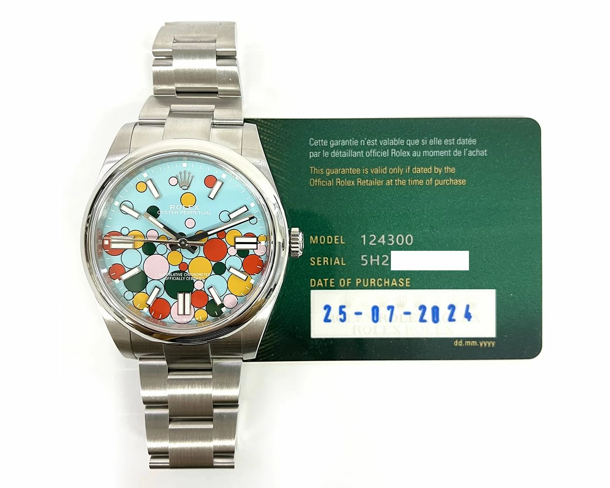 Buy Genuine Used Rolex Oyster Perpetual 41 124300 Watch Turqouise Blue Celebration Motif Dial SKU 9227
