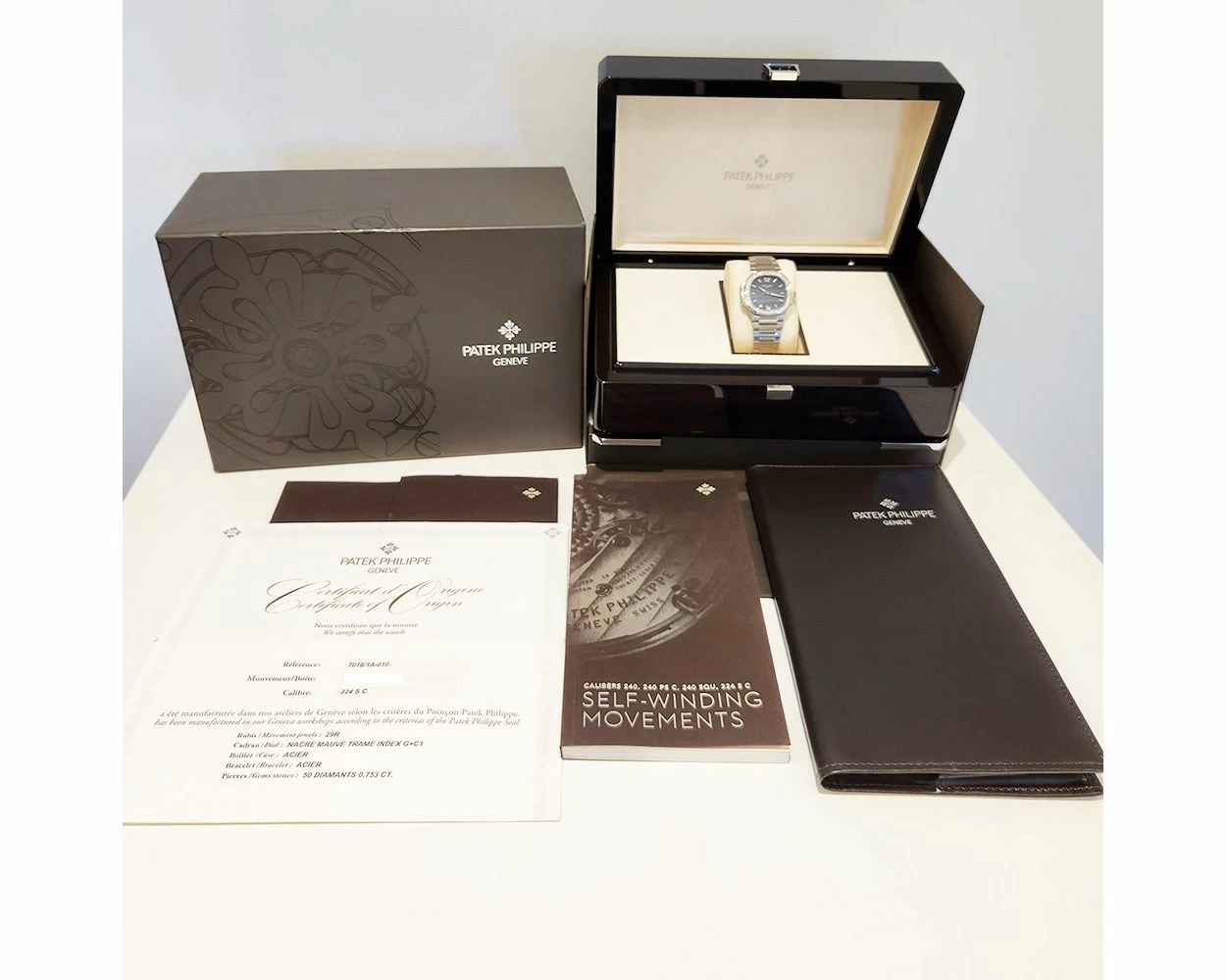 By Genuine Patek Philippe Nautilus 7018 1A 010 Blue Dial Diamond Bezel SKU 10235
