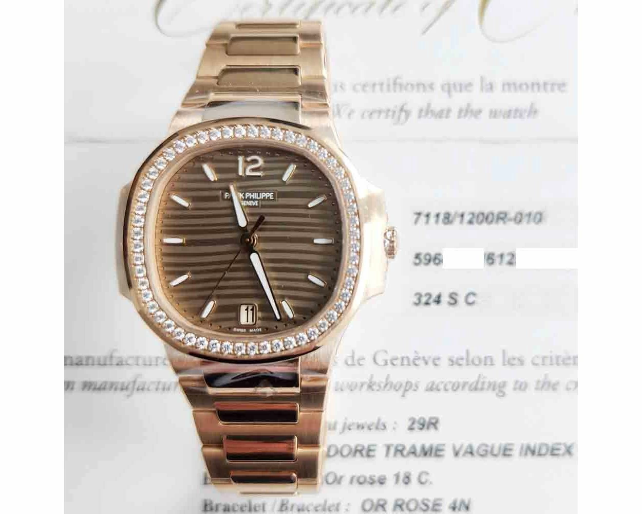 2016 Patek Philippe Nautilus 35.2mm Rose Gold Gold Dial 7118 1200R 010 Box Papers