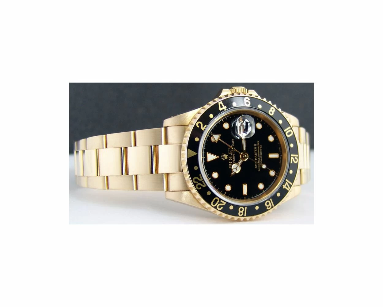Rolex GMT-Master II, Black Dial, Yellow Gold, 16718