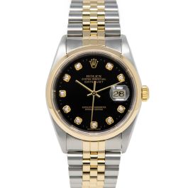 Gold and silver discount rolex black face
