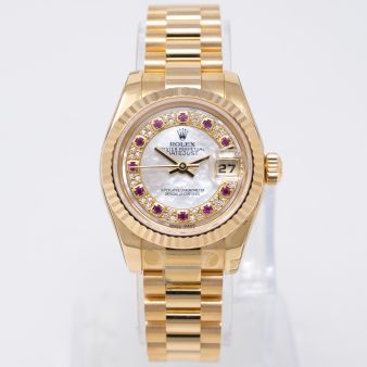 Rolex Lady-Datejust 26 179178 Wristwatch, Mother of Pearl Myriad Ruby Dial, President bracelet, Fluted Bezel