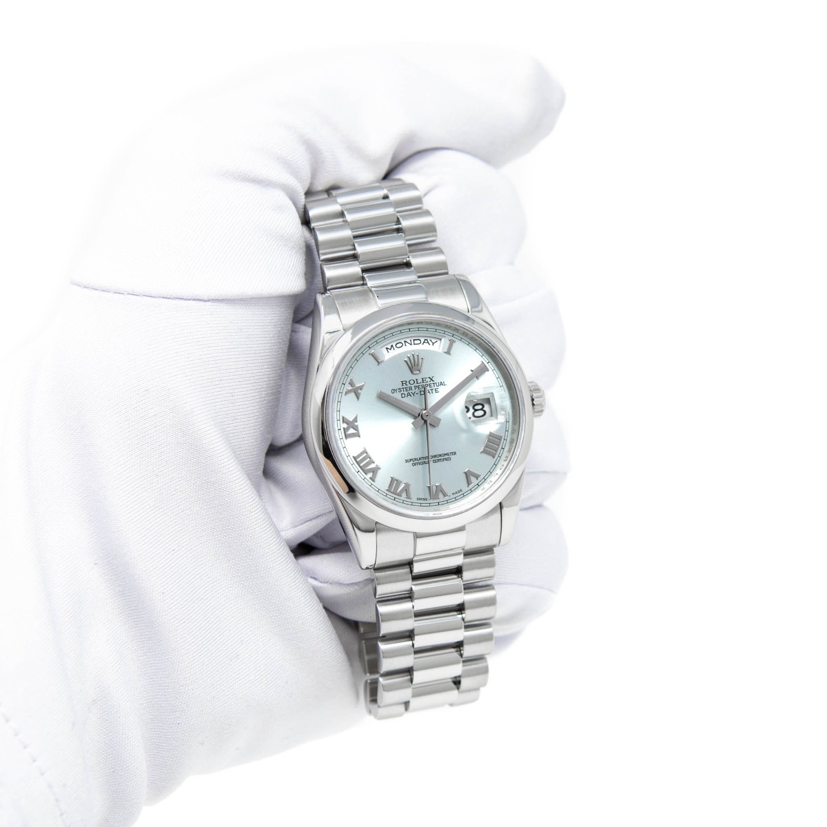 rolex day date platinum on wrist