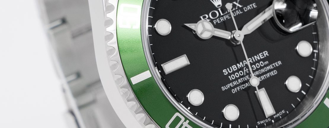 Rolex Submariner Kermit zoomed in at the 9 hour marker