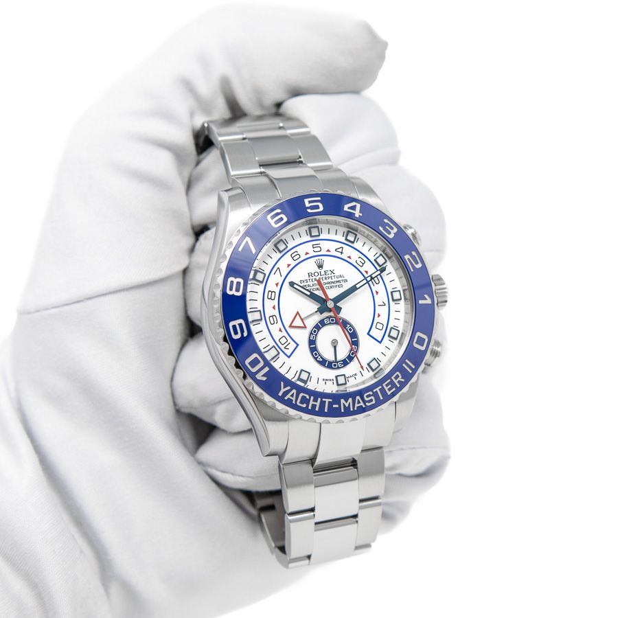 A white gloved hand holding the Rolex Yacht-Master II 116680 in 904L Stainless Steel