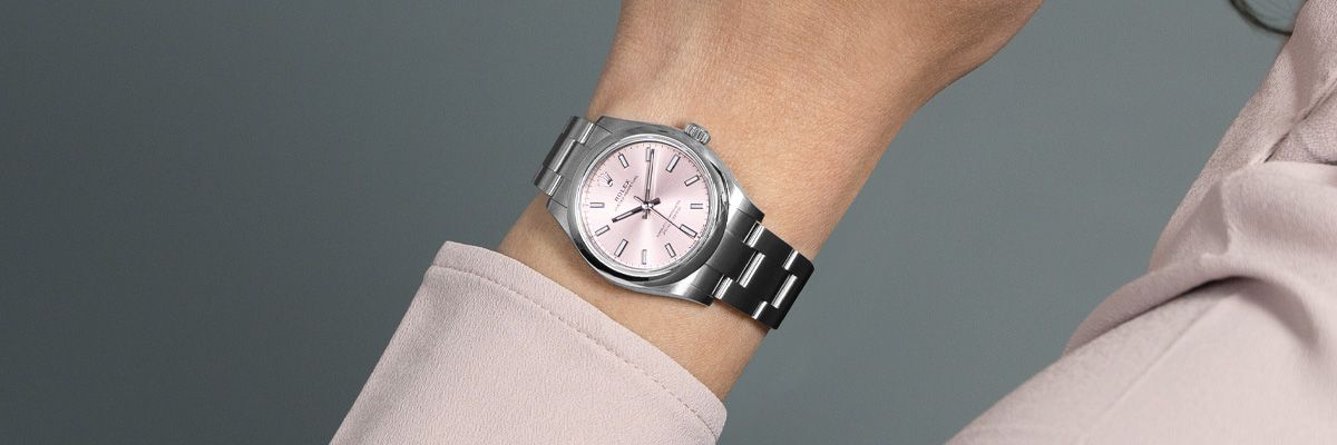 Rolex Oyster Perpetual 31 277200 Wristwatch, Light Pink Dial Rolex Oyster Perpetual 31 277200 wristwatch with the Light Pink dial being worn on a woman model