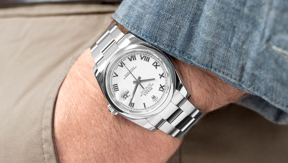 Man wearing a Rolex watch