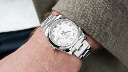 Man wearing a Rolex watch
