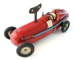 A red toy car with turn key