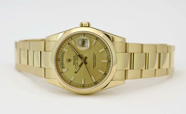 Rolex Day-Date 118208 Champagne Dial and Oyster Bracelet A yellow gold Rolex Day-Date 118208 with a Champagne Dial and Oyster Bracelet