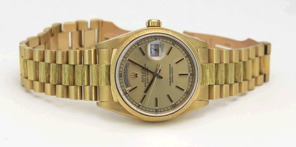 Rolex Day-Date 18078 with a Champagne Dial and a Bark President Bracelet A yellow gold Rolex Day-Date 18078 with a Champagne Dial and a Bark President Bracelet