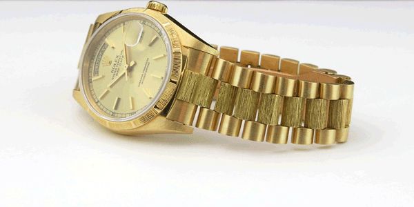 Rolex Day-Date 18248 with a Champagne Dial and a Bark President Bracelet A yellow gold Rolex Day-Date 18248 with a Champagne Dial and a Bark President Bracelet